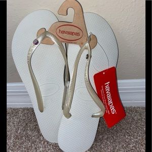Havaianas size 10 -11 white and gold